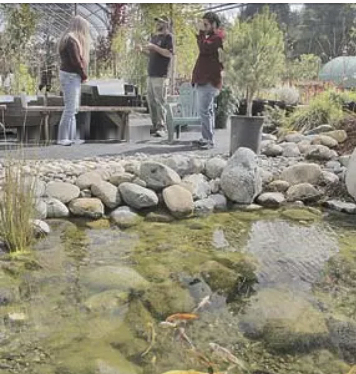 Archival newspaper photograph of Keith Hamm leading a rainwater-catchment workshop at his former nursery