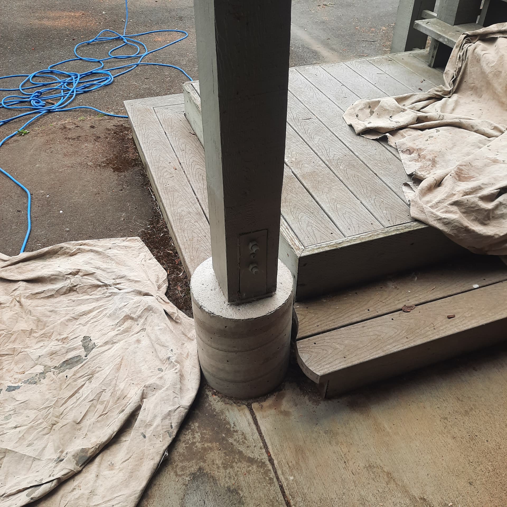 Rebuilt deck post and structural connection after targeted repair